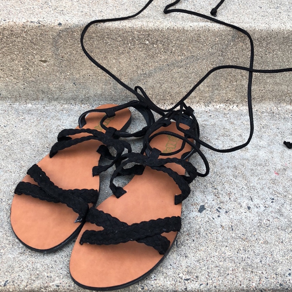 Black lace up gladiator Sandals, never worn.